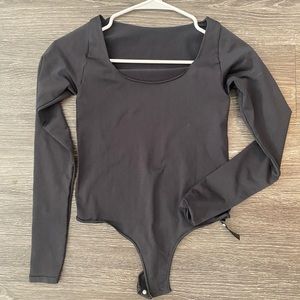 SKIMS Essential Long Sleeve Scoop Neck Bodysuit In Onyx